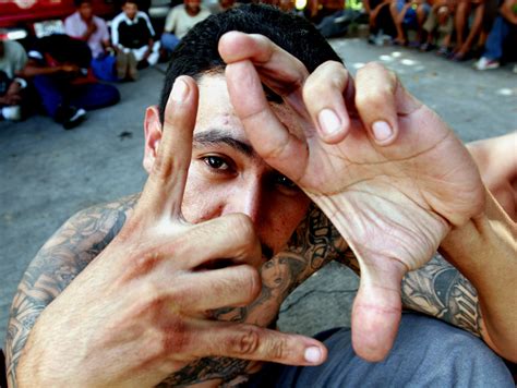 Ventana: A lookout among Mexican and Latin King gangs. . Mexican gang signs